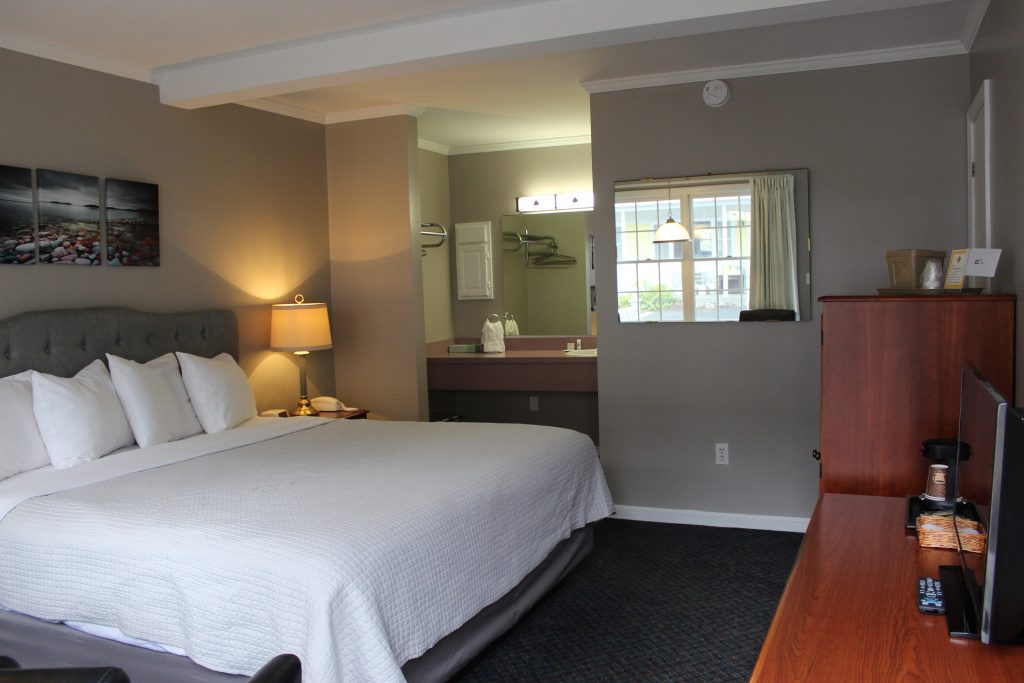 Motel room with king bed