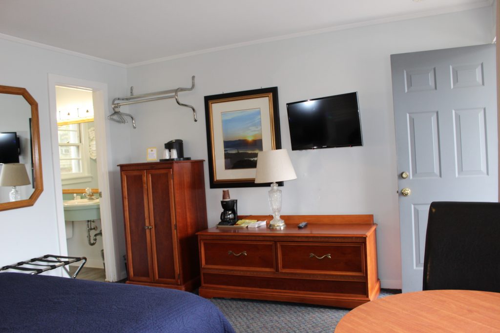 Motel Room with wood furnishings
